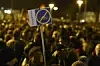 A man holds an anti mosque banner during a rally of LEGIDA, a local copycat of Dresden’s right-wing populist movement PEGIDA (Patriotic Europeans Against the Islamisation of the Occident), in Leipzig, eastern Germany on January 12, 2015. Pegida was set to march in Dresden and other cities in Germany for their weekly demonstration since autumn 2014, hoping to gain numbers after the jihadist bloodshed in Paris, that killed 17 people, most at the Paris offices of satirical magazine Charlie Hebdo. AFP PHOTO / ODD ANDERSEN. (Foto: ODD ANDERSEN/Scanpix 2015)