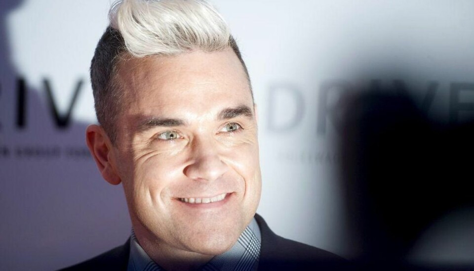 Se Robbies nye hår Robbie Williams viste de nye lokker frem på et besøg i Tyskland. Foto: Stefanie Loos/Scanpix