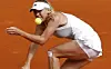 Caroline Wozniacki taber kvartfinalen ved Madrid Open til Maria Sharapova. Foto: ANDREA COMAS/Scanpix.