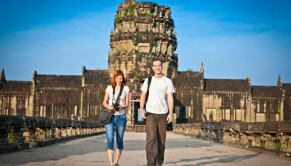 Turister tager billeder af deres bare numser i Angkor-templet i Cambodja. Foto: Iris/Scanpix (Modelfoto)