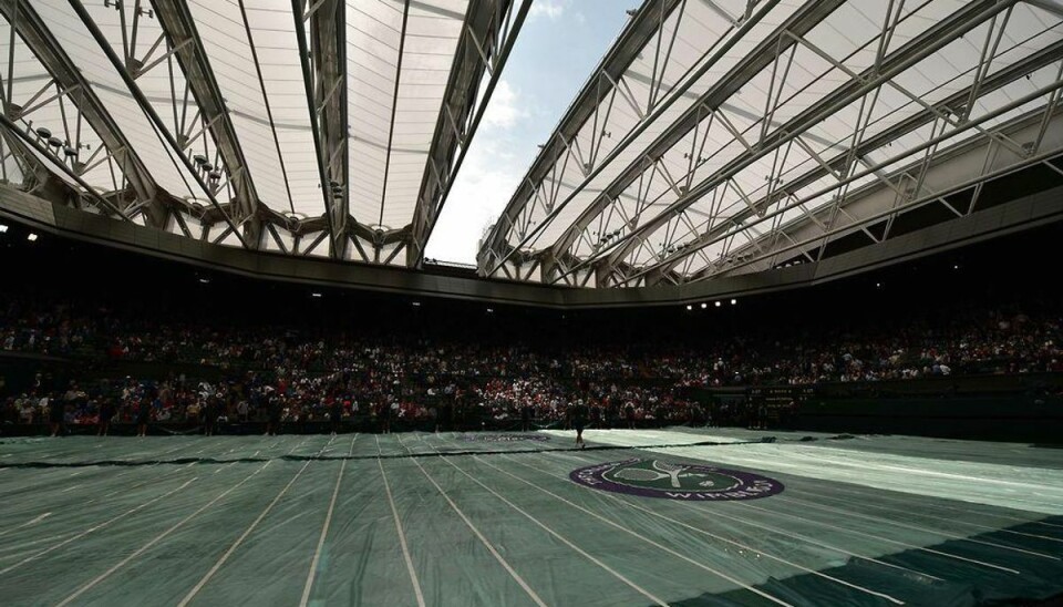 Regn over Wimbledon afbryder Federer og Murray Foto: LEON NEAL/Scanpix.
