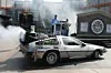 TO GO WITH AFP STORY BY MARIETTE LE ROUX (FILES)- – A file photo taken on August 2, 2007 shows US actor Christopher Lloyd (passenger’s seat) arriving in a “Back to the Future” style DeLorean at a ceremony to mark a month-long countdown to the closure of the 14-year-old “Back to the Future – The Ride” at Universal Studios Hollywood in University City, California. When Marty McFly and “Doc” Brown burst into 2015 in a time machine, straight from the year 1985, they encounter a brave new world of garbage-fueled flying cars, self-tying shoes and robot waiters. AFP PHOTO / ROBYN BECK