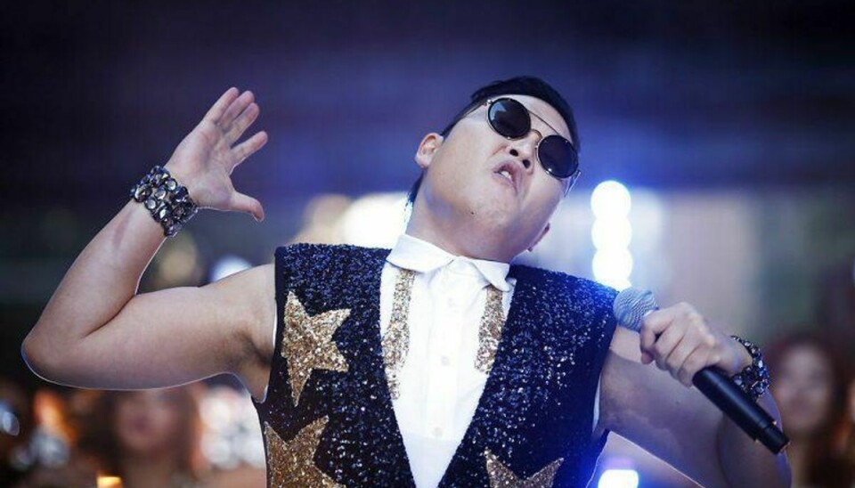 South Korean singer Psy performs his hit “Gangnam Style” during a morning television appearance in central Sydney October 17, 2012. Hundreds of fans came to see Psy’s free performance of his chart topping hit which has been watched more than 478 million times on YouTube since July. REUTERS/Tim Wimborne (AUSTRALIA – Tags: ENTERTAINMENT)