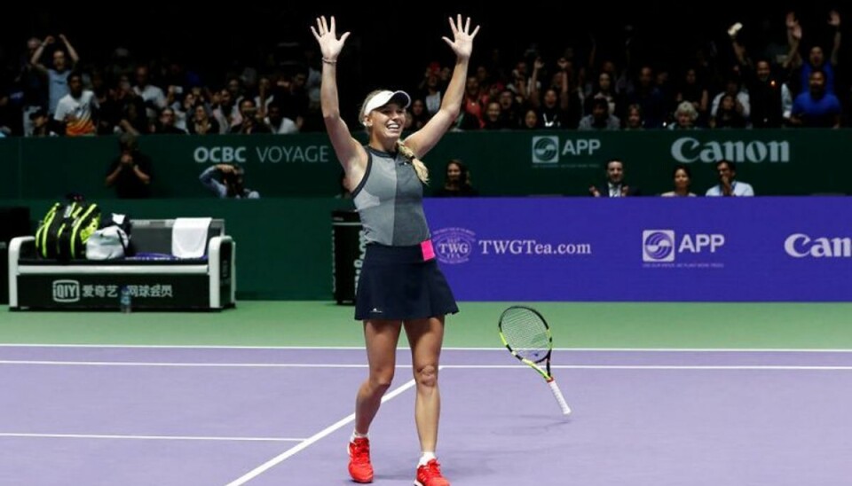 Wozniacki tager karrierens største triumf i WTA Finals Caroline Wozniacki efter sin hidtil største triumf. KLIK for flere billeder. Foto: Edgar Su/Scanpix.
