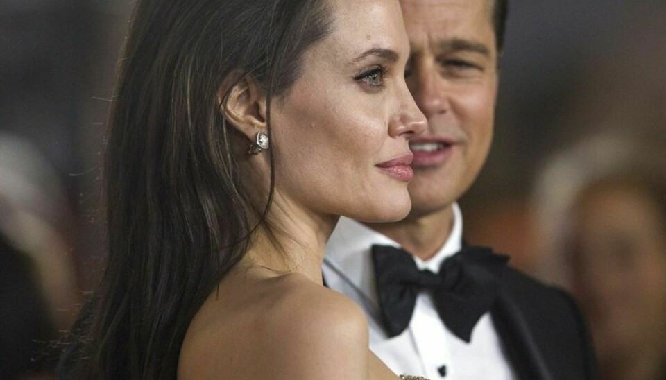 Angelina Jolie og Brad Pitt har flere børn sammen. En dommer har bestemt, at Pitt skal have mere samvær med dem. Foto: Scanpix/Mario Anzuoni.
