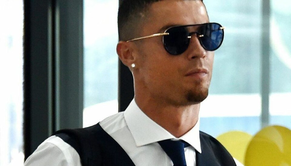 Cristiano Ronaldo bør nok finde smilet frem med sin nye kontrakt in mente. Arkivfoto: Scanpix