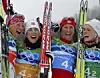 Vibeke Skofterud (tv.) er fundet død i en norsk havn. Her ses hun med Kristin Stoermer Steira, Marit Bjoergen og Therese Johaug efter en OL-sejr i Vancouver 2010. Arkivfoto: Scanpix