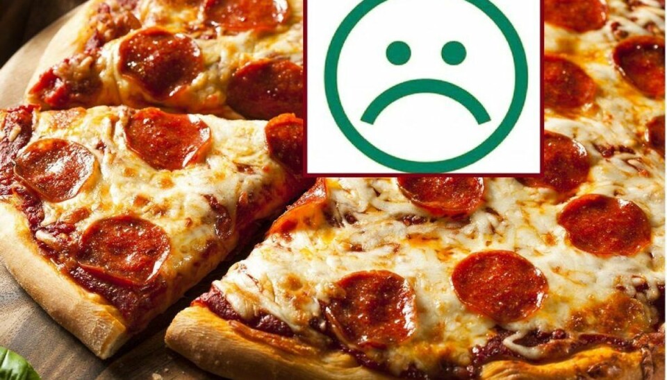 Den sure smiley får Bambino Pizza blandt andet for at ryge i køkkenet og manglende egenkontrol. Arkivfoto: Scanpix/Newsbreak.dk.