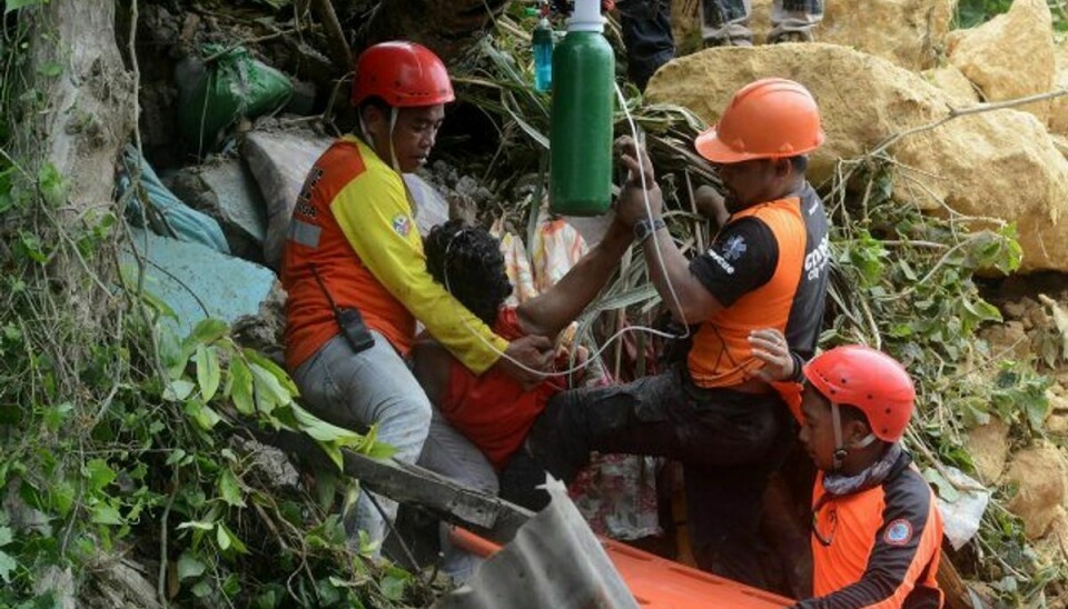 Op mod 50 mennesker savnes fortsat efter et jordskred på øen Cebu i Filippinerne torsdag morgen. Foto: Str/AFP