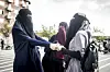 Her fra en demonstration imod tildækningsforbuddet. Kvinderne er iført niqab, ikke burka. (Foto: Scanpix)