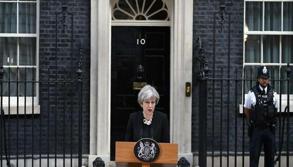 Theresa May foran Downing Street 10. Justin TALLIS/Scanpix. Theresa May foran Downing Street 10. Justin TALLIS/Scanpix.