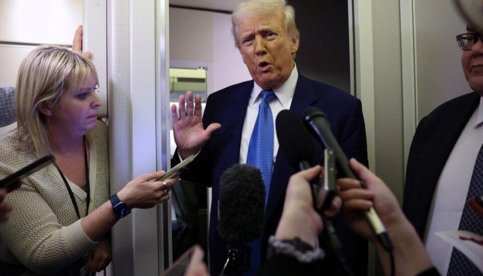 USA's præsident, Donald Trump, taler med journalister om bord på Air Force One på vej tilbage til Washington D.C. fra Florida.
