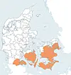 Kort over Danmark med kommuner, hvor flere sydlige og østlige områder er farvet orange.