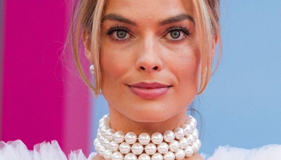 Margot Robbie har hovedrollen som Barbie i den nye film 'Barbie'. Margot Robbie har hovedrollen som Barbie i den nye film 'Barbie'.