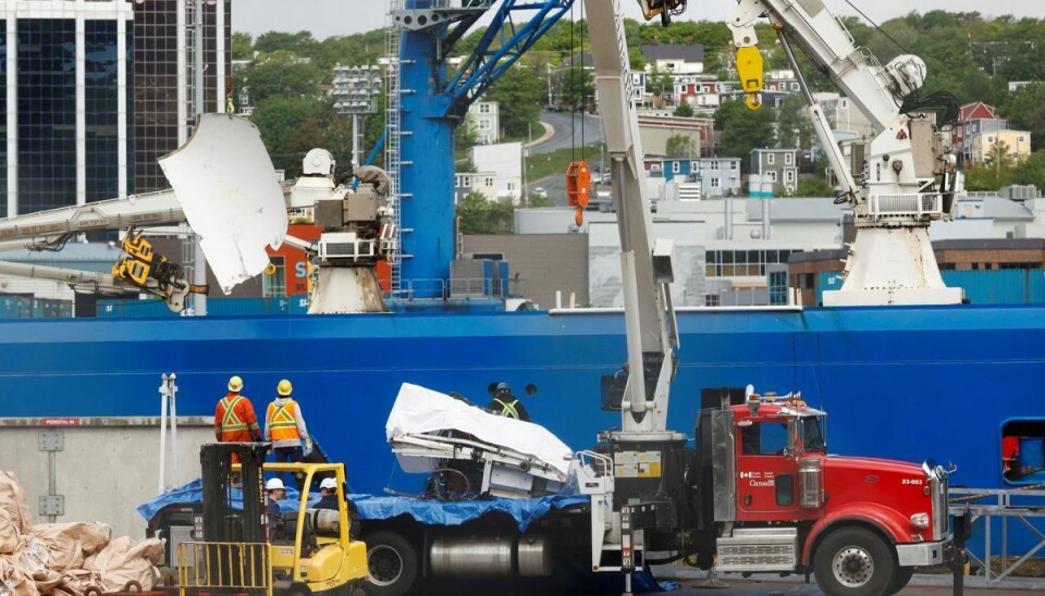Vragdele fra den imploderede ubåd 'Titan' blev onsdag bragt på land af skibet 'Horizon Arctic' på havnen i St. John's i det østlige Canada. Vragdele fra den imploderede ubåd 'Titan' blev onsdag bragt på land af skibet 'Horizon Arctic' på havnen i St. John's i det østlige Canada.