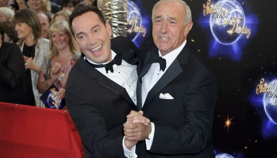 Len Goodman (th) ses her sammen med koreografen Craig Revel Horwood under Strictly Come Dancing i London i september 2011.