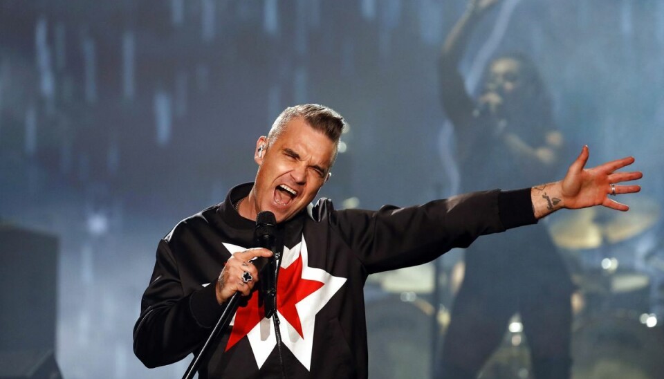 Robbie Williams har for nylig kunnet fejre 25 år som soloartist. Det blev i september markeret med albummet 'XXV', der strøg ind på den britiske hitliste. Til sommer optræder han på festivalen Heartland i Danmark. (Arkivfoto). Robbie Williams har for nylig kunnet fejre 25 år som soloartist. Det blev i september markeret med albummet 'XXV', der strøg ind på den britiske hitliste. Til sommer optræder han på festivalen Heartland i Danmark. (Arkivfoto).