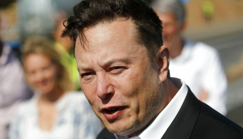 (FILES) In this file photo taken on September 3, 2020 Tesla CEO Elon Musk talks to media as he arrives to visit the construction site of the future US electric car giant Tesla, in Gruenheide near Berlin. - The court battle between Elon Musk and Twitter kicked off on July 19, 2022, as the social media firm tries to force the entrepreneur to honor their $44 billion buyout deal. The first hearing will center on Twitter's push to set a trial date for as early as September in a case that has massive stakes for both parties. (Photo by Odd ANDERSEN / AFP) (FILES) In this file photo taken on September 3, 2020 Tesla CEO Elon Musk talks to media as he arrives to visit the construction site of the future US electric car giant Tesla, in Gruenheide near Berlin. - The court battle between Elon Musk and Twitter kicked off on July 19, 2022, as the social media firm tries to force the entrepreneur to honor their $44 billion buyout deal. The first hearing will center on Twitter's push to set a trial date for as early as September in a case that has massive stakes for both parties. (Photo by Odd ANDERSEN / AFP)