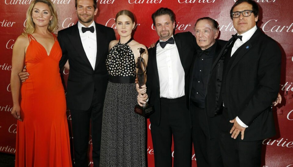 Paul Herman, nummer to fra højre, ses her sammen med castet på filmsuccessen 'American Hustle', der vandt 'The Ensemble Performance Award' i 2014.