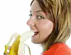 pretty woman eating banana
