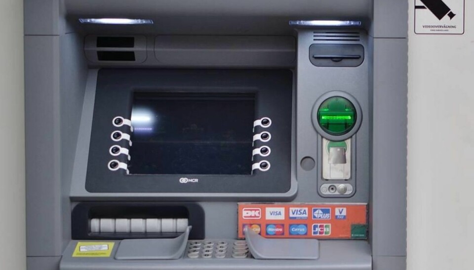 Røvede halv million: I fængsel for at sprænge Dankort-automat Fire gerningsmænd bag kuppet slap i første omgang væk med 432.600 kroner, men de blev senere fanget – i dag har de fået deres domme. Arkivfoto: Colourbox.