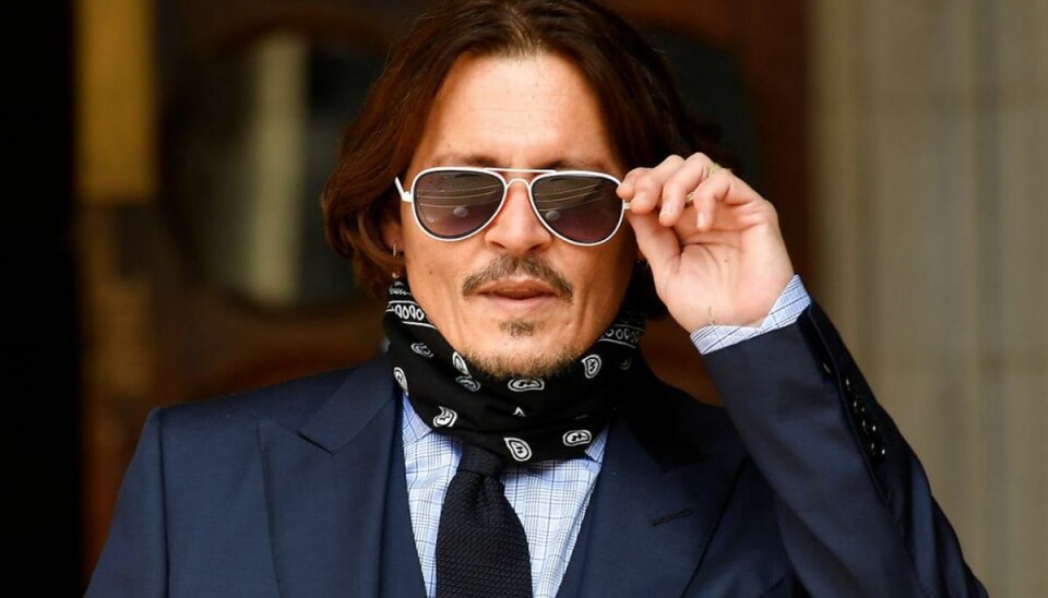Foto: Toby Melville / SCANPIX Her ses Johnny Depp ankomme til retten tirsdag 14. juli i forbindelse med hans injurieringssag mod avisen The Sun.Foto: Toby Melville / SCANPIX