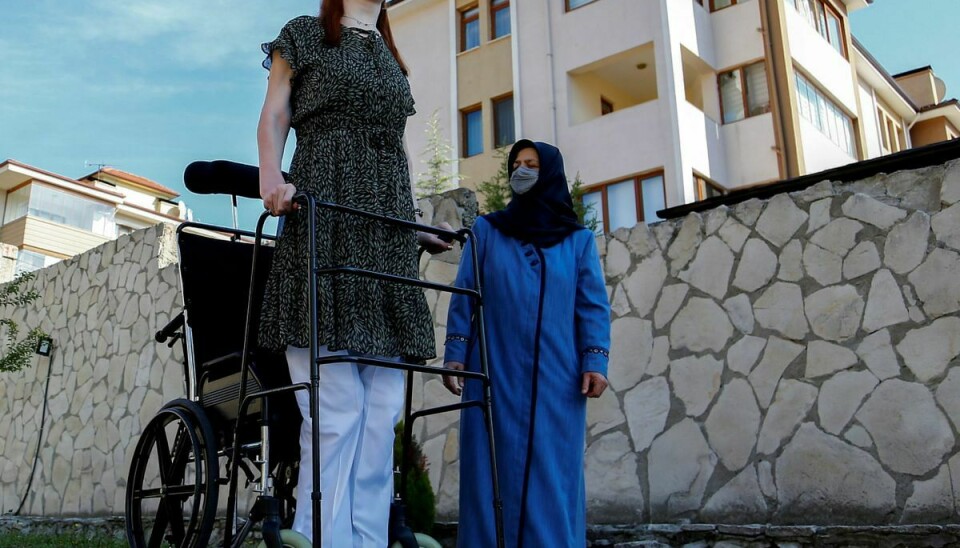 World's tallest woman Rumeysa Gelgi poses with her mother Safiye Gelgi during a news conference outside their home in Safranbolu, Karabuk province, Turkey, October 14, 2021. REUTERS/Cagla Gurdogan