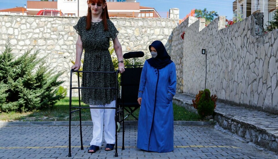 World's tallest woman Rumeysa Gelgi poses with her mother Safiye Gelgi during a news conference outside their home in Safranbolu, Karabuk province, Turkey, October 14, 2021. REUTERS/Cagla Gurdogan