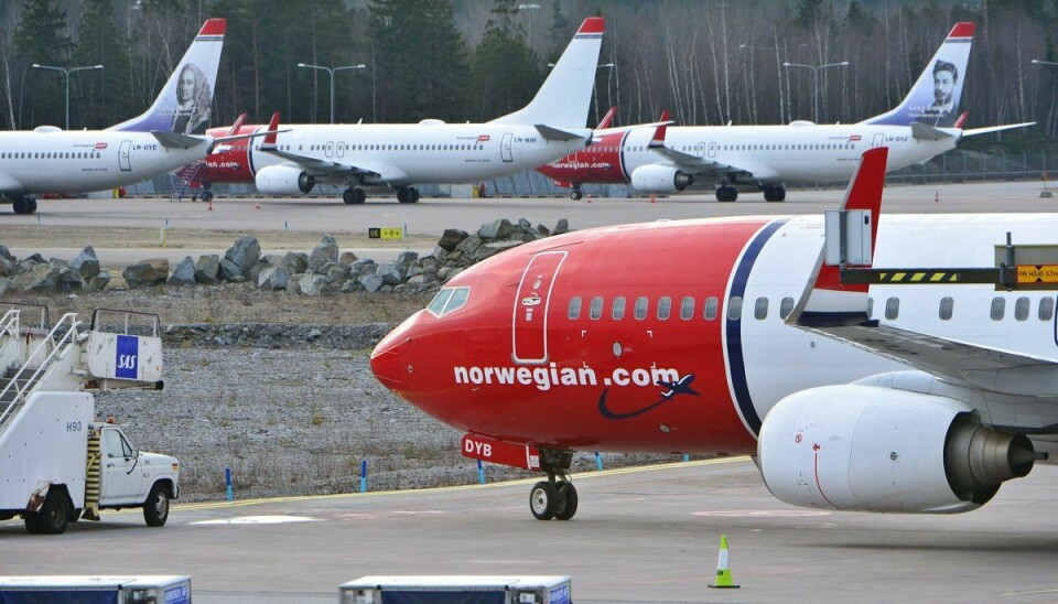 Fra på mandag er det ikke længere et krav at bære mundbind, når man flyver med Norwegian indenrigs i Skandinavien eller på tværs af de tre skandinaviske lande. (Arkivfoto)