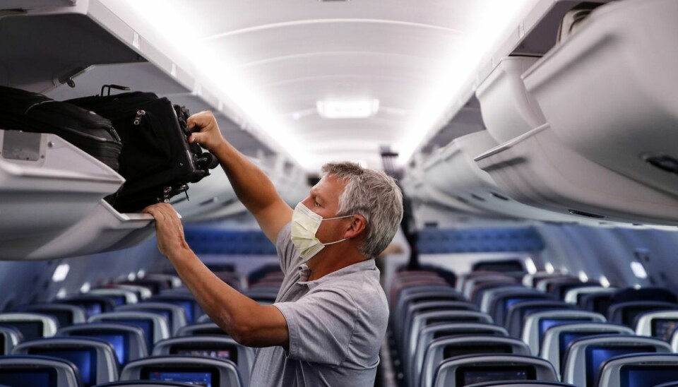 Mundbind i amerikanske fly vil stadig være påkrævet frem til januar. (Arkivfoto) Mundbind i amerikanske fly vil stadig være påkrævet frem til januar. (Arkivfoto)