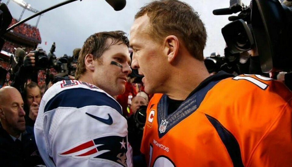 Peyton Manning (th.) og Denver Broncos besejrede Tom Bradys New England Patriots og er klar til Super Bowl 50. Det samme er Carolina Panthers efter en storsejr over Arizona Cardinals. Foto: Ezra Shaw/Scanpix