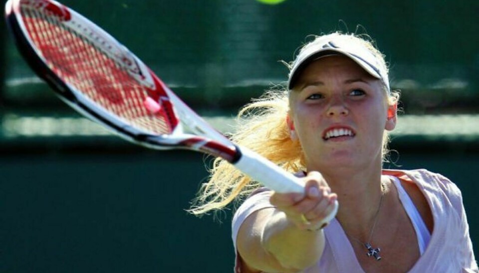 Caroline Wozniacki er Danmark største tennisprofil. I Danmark opleves der forsøg på at bestikke spillerne til at tabe kampe. Foto: POLFOTO/AP/Darron Cummings/free