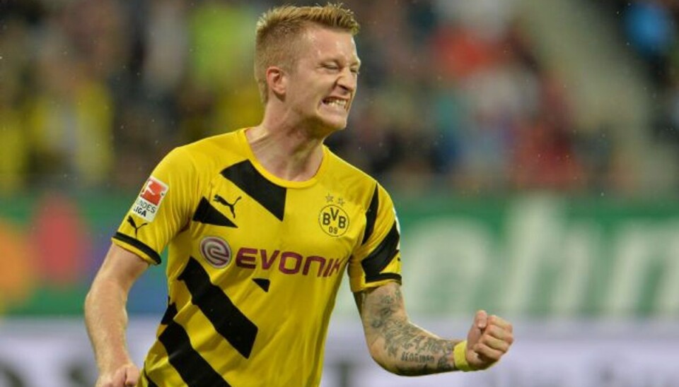 Kanonstart giver Dortmund første sæsonsejr Den tyske landsholdsspiller Marco Reus åbnede scoringen, da Dortmund besejrede Augsburg med 3-2. Foto: Kerstin Joensson/AP