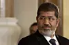 Den tidligere egyptiske præsident Mohamed Mursi bliver anklaget for at have udleveret statshemmeligheder til Qatar. Foto: Maya Alleruzzo/AP