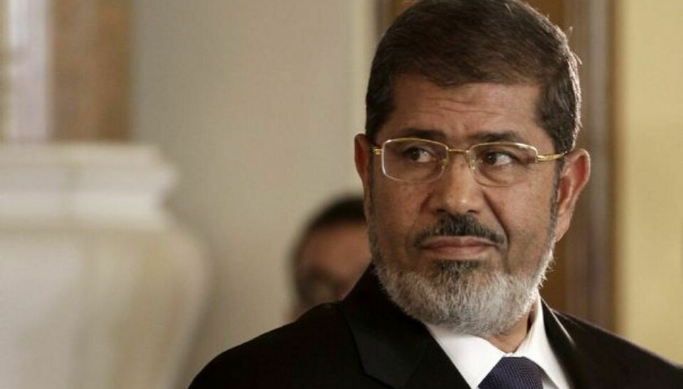 Den tidligere egyptiske præsident Mohamed Mursi bliver anklaget for at have udleveret statshemmeligheder til Qatar. Foto: Maya Alleruzzo/AP