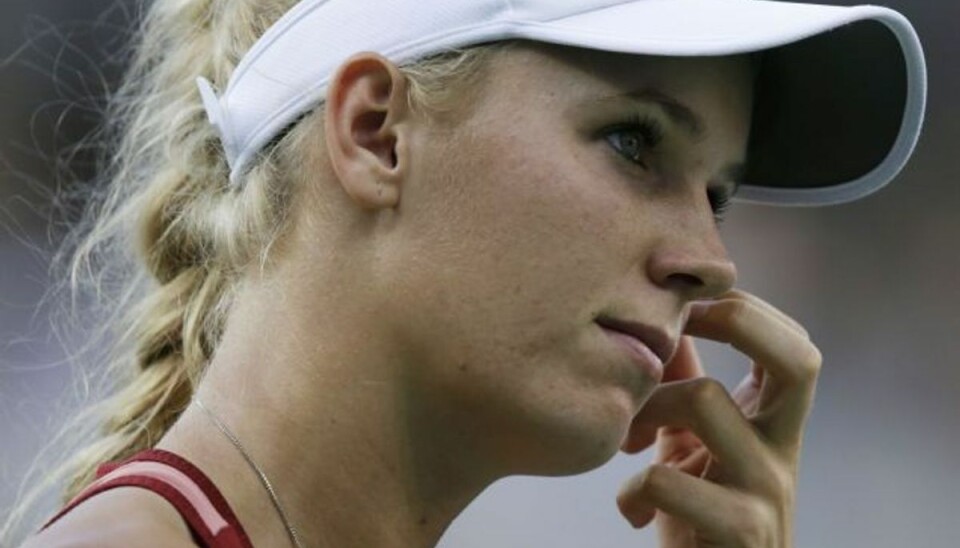 Stjerne-exit kan løfte Wozniacki Hvis den kinesiske tennisstjerne Li Na stopper sin karierre, står Caroline Wozniacki til at rykke frem på ranglisterne. Foto: Charles Krupa/AP